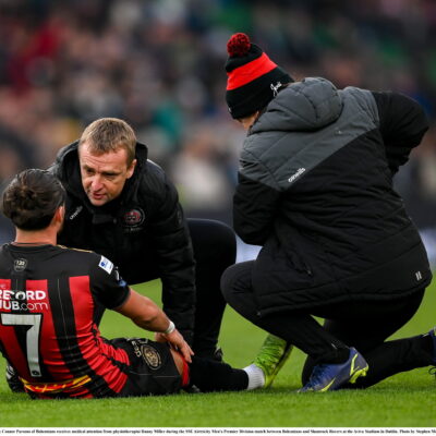 16 February 2025; Connor Parsons of Bohemians receives medical attention from physiotherapist Danny Miller during the SSE Airtricity Men's Premier Division match between Bohemians and Shamrock Rovers at the Aviva Stadium in Dublin. Photo by Stephen McCarthy/Sportsfile
